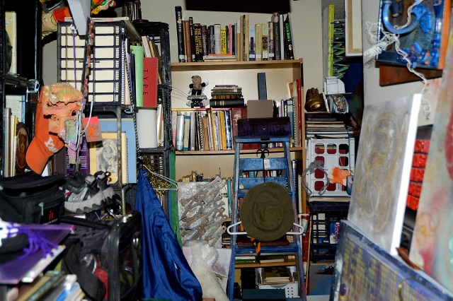 Looking from bathroom through bedroom area without a bed - before general move of stuff to storage unit.